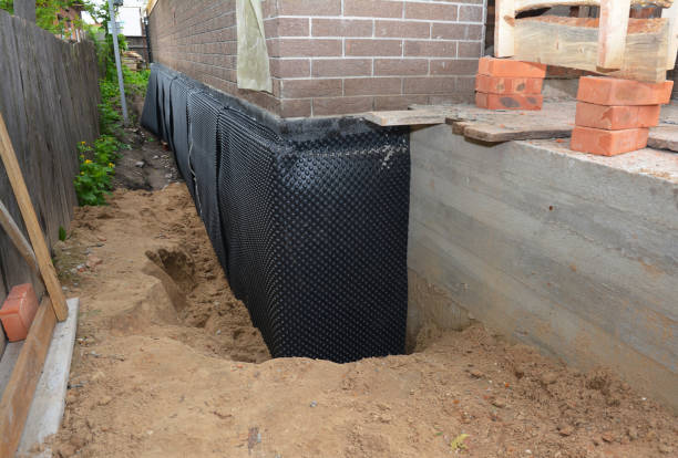 SJ Waterproofing Pros technician performing targeted Waterproofing assessment in Keansburg, NJ